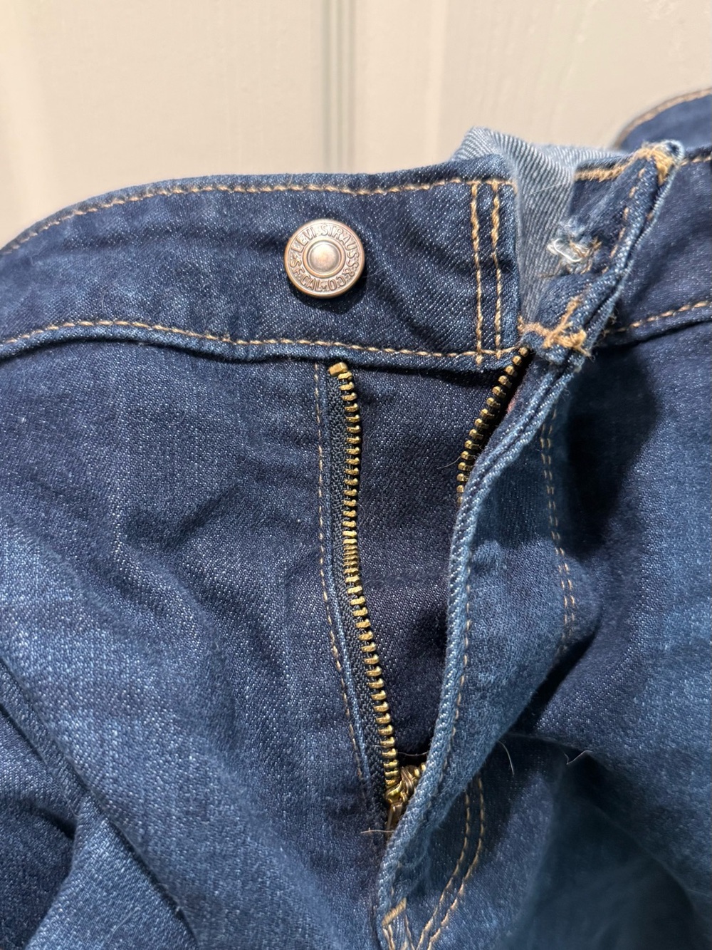 Women’s Levi's Indigo Blue Denim Jeans with Gold Hardware